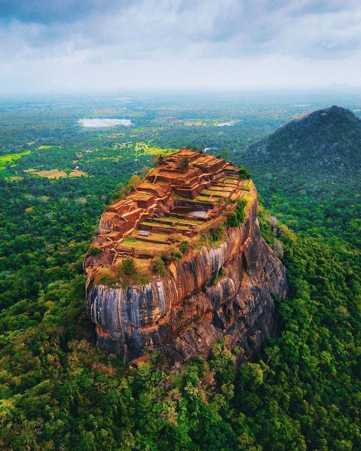 Aerial view of Sigiriya Lion Rock rising from the jungle