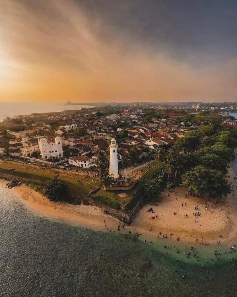 Galle Fort lighthouse at golden hour from above